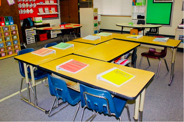 student visual schedules on student desks in a special education classroom