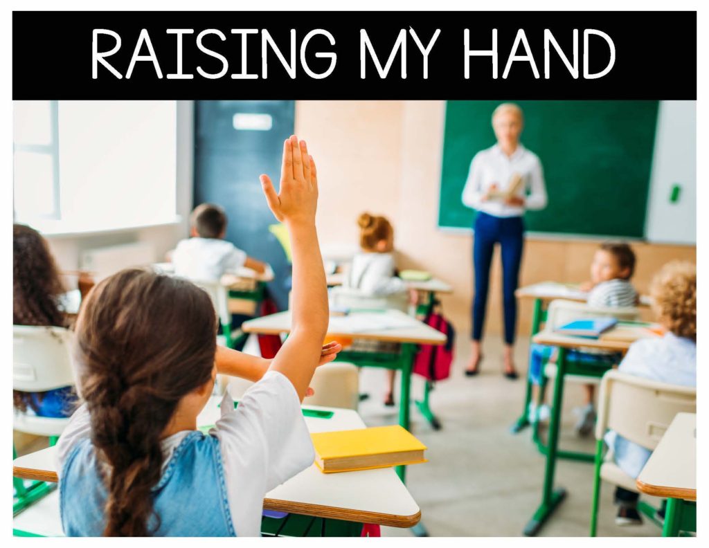 students raising hands